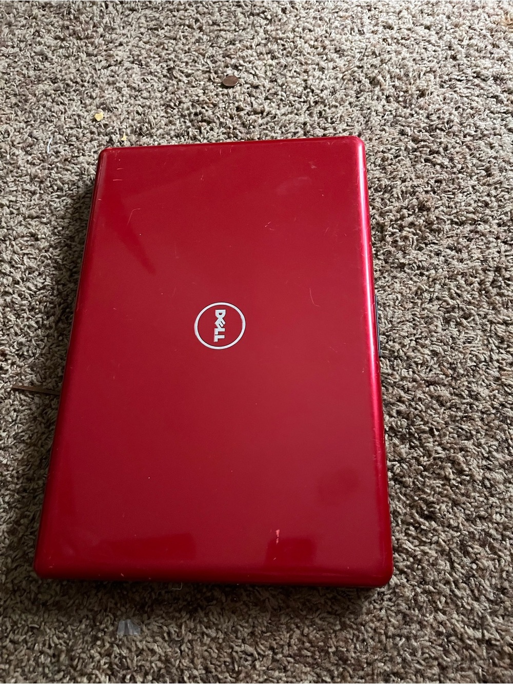Dell Red Laptop with Center Logo